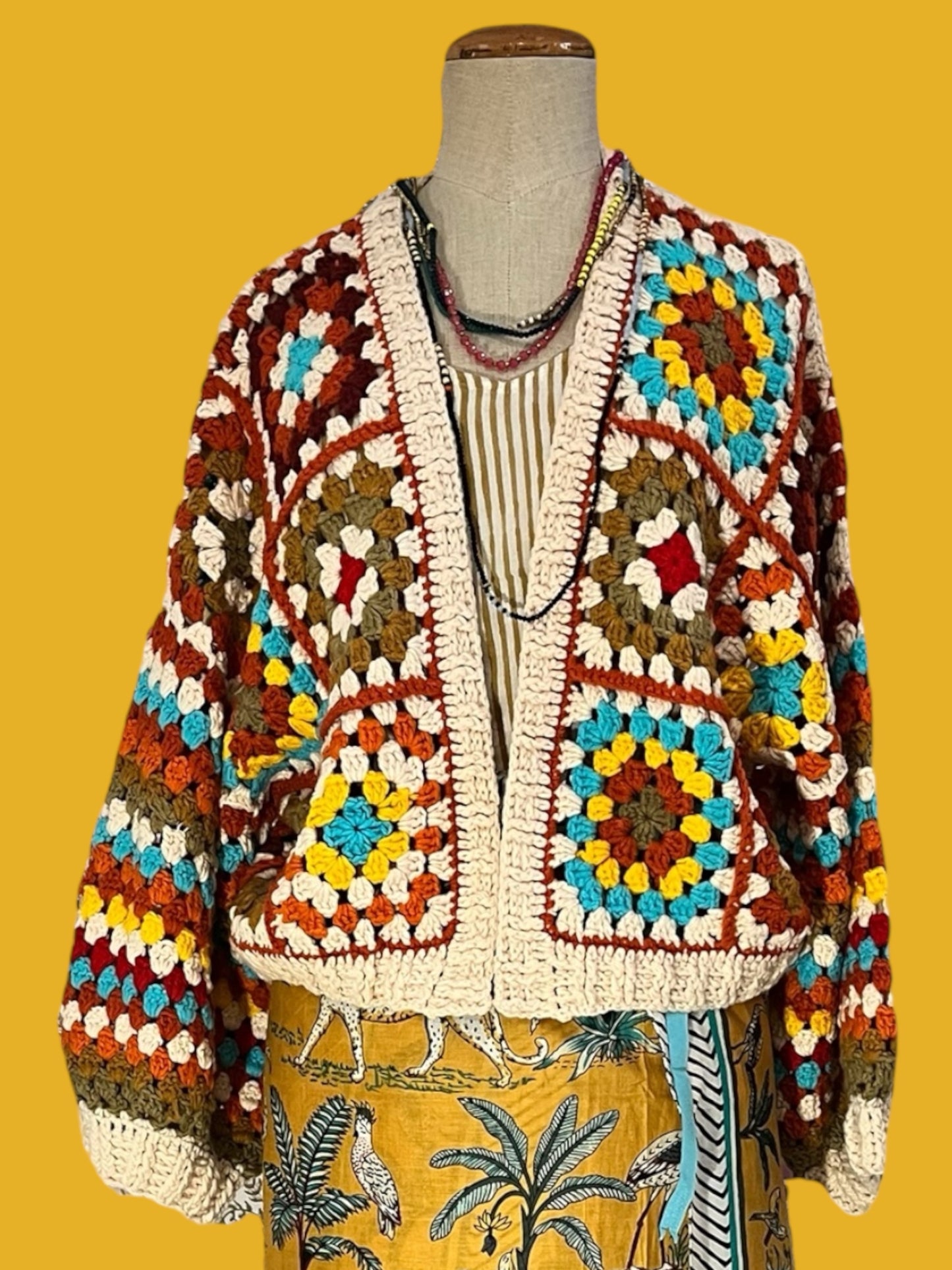 Crochet jacket and pareo skirt