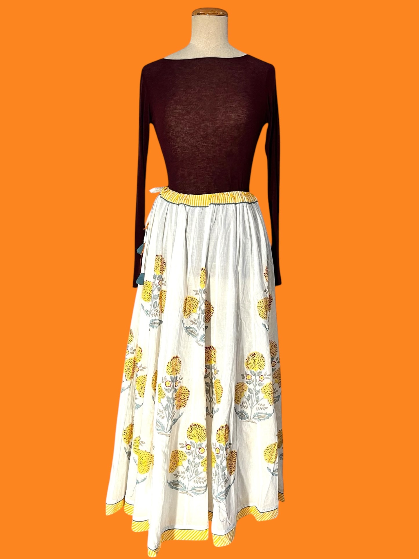 kantha double-face vest and long yellow block print cotton skirt