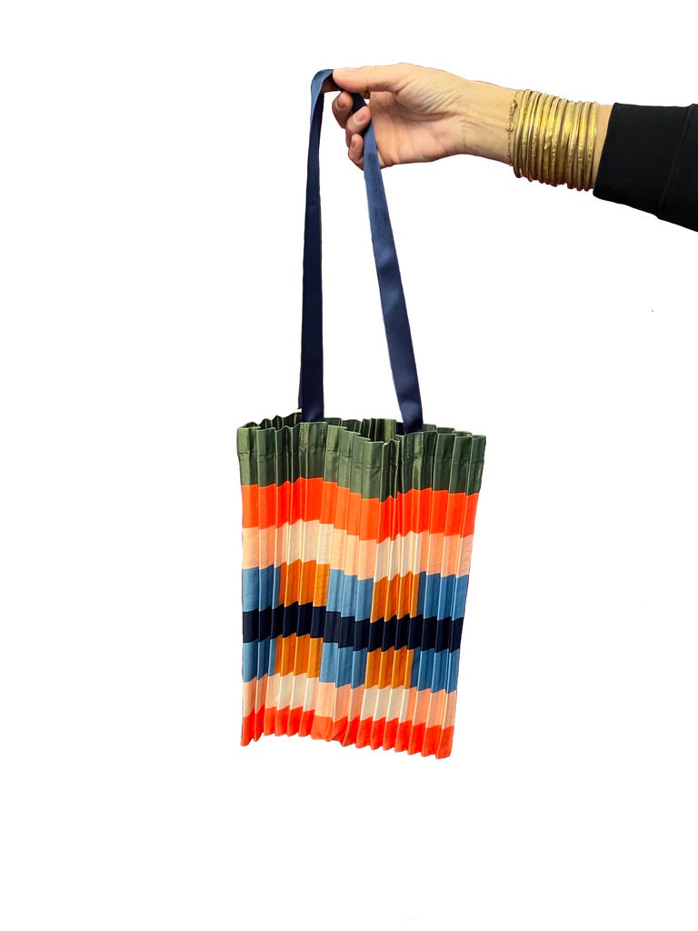 Wool jacket, printed viscose pants, Multitudes fabric bag, fine 100% cashmere top