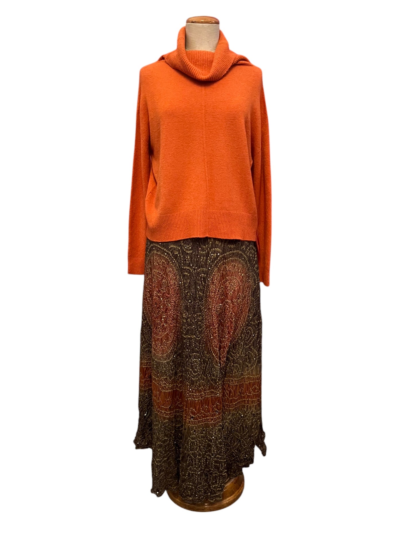 Hand knit woollen jacket, high neck wool jersey, long brown silk skirt