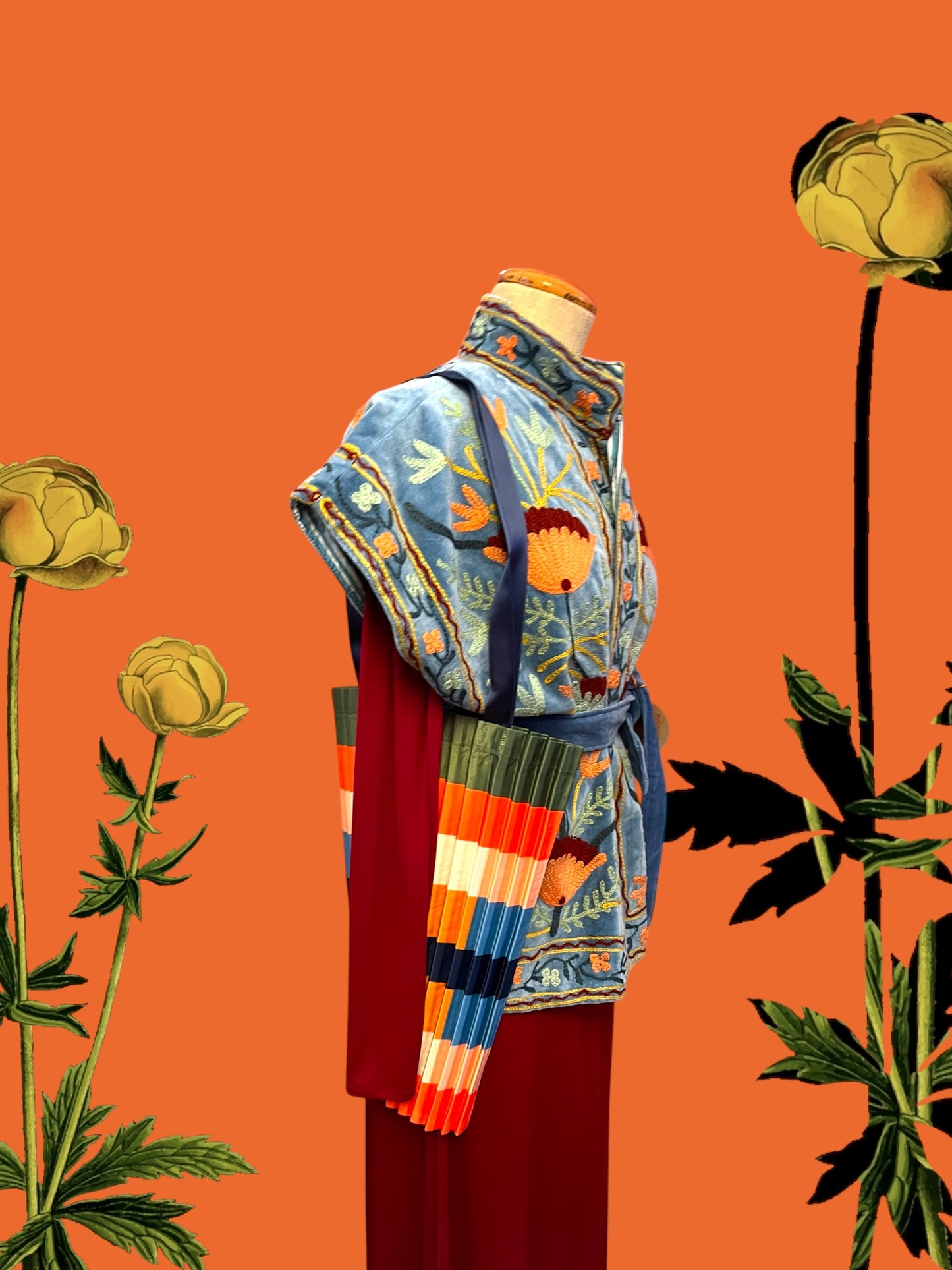 Long bordeaux nylon dress with Suzani velvet vest and Multitudes bag